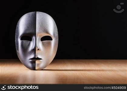 Mask against the dark background
