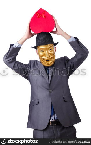 Masked man with giftbox on white