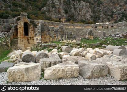 Masks and ruins of theater in Myra, Turkey