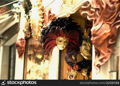 Masks hanging at the entrance of a store