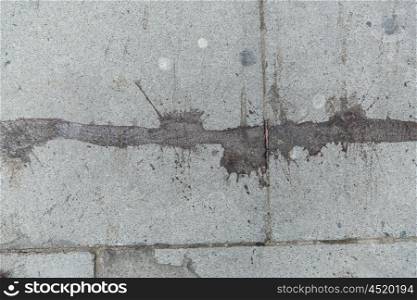 masonry and stonework concept - close up of dirty stone plate or pavement. close up of dirty stone plate or pavement