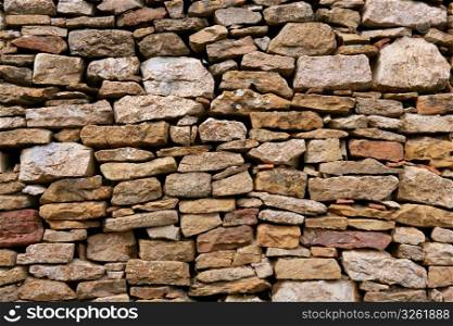 Masonry stone wall texture, old Spain ancient architecture detail