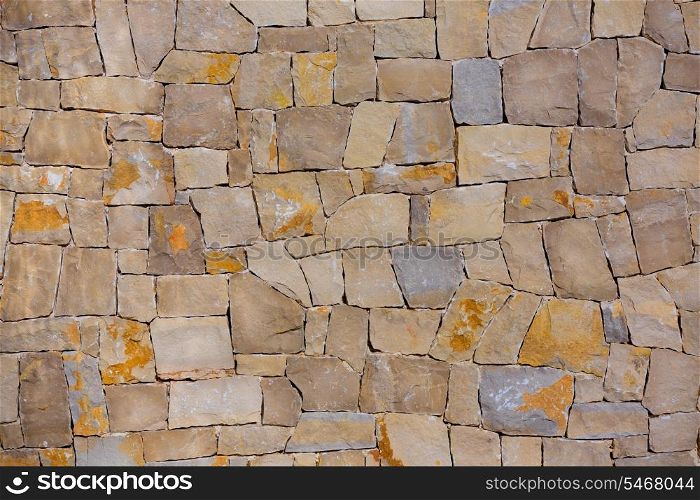 Masonry wall textre of handmade stones traditional style in Spain