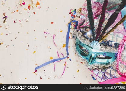 masquerade carnival mask on wooden table