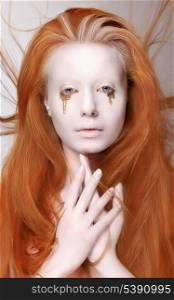 Masquerade. Redhead Woman with Futuristic Make-up. Fantasy