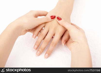 Massage of female hands by the female hands, isolated