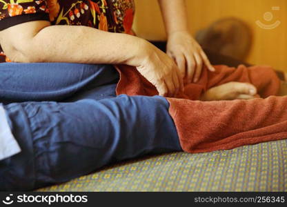 Massage with woman in old Thai traditional