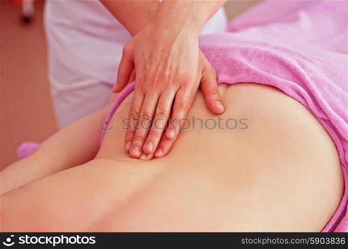 massage. Woman having a massage at spa