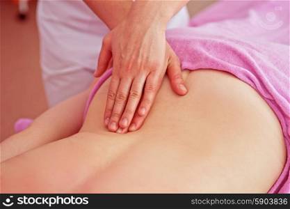 massage. Woman having a massage at spa