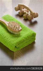 massager and hairbrush with towel