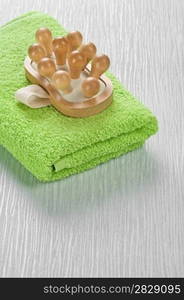 massager on green towel