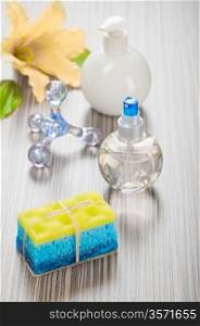 massager sponge soap flower and bottles