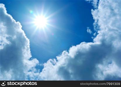 Massive clouds in clear sky. Composition of nature.