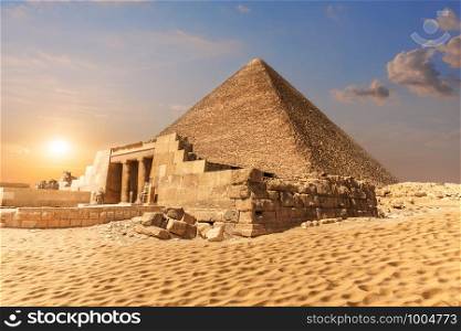 Mastaba of Seshemnefer IV and the Pyramid of Cheops in Giza.. Mastaba of Seshemnefer IV and the Pyramid of Cheops in Giza