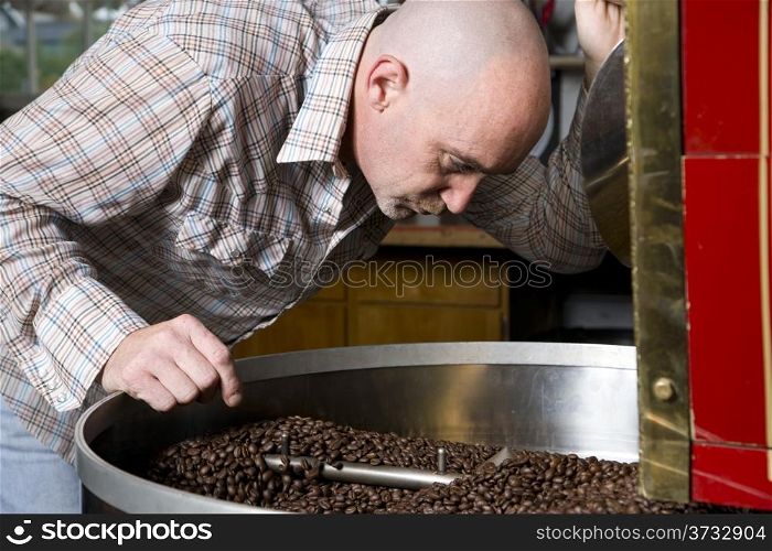 Master Roaster Checks Aroma Roasted Coffee Beans