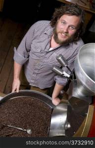 Master Roaster Stands By While Roasted Coffee Beans Cool