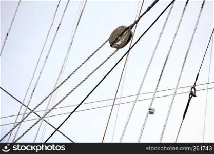 Masts and rope of sailing ship old boat detail