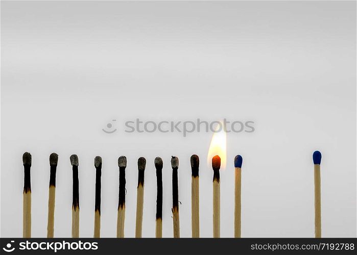 Matches in a row close together ignite one another, one with a greater distance remains intact