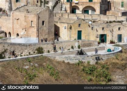 "Matera, Italy - September 15, 2019: Bond 25. Setting the scenery for car chase scenes from the movie "No Time to Die" in Sassi, Matera, Italy.. Bond 25. Setting the scenery for car chase scenes from the movie "No Time to Die" in Sassi, Matera, Italy."