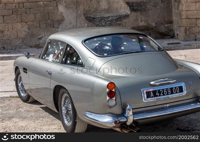 Matera, Italy - September 15, 2019: the Aston Martin DB5 used on the set of the latest James Bond movie &rsquo;No time to die&rsquo; in Matera, Italy.. the Aston Martin DB5 used on the set of the latest James Bond movie &rsquo;No time to die&rsquo; in Matera, Italy.