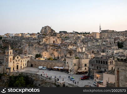 "Matera; Italy - September 17; 2019: Bond 25. Scene of a procession with extras carrying candles. from the movie "No Time to Die" in Sassi; Matera; Italy.. Bond 25. Scene of a procession with extras carrying candles. from the movie "No Time to Die" in Sassi; Matera; Italy."