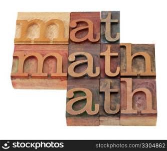 math word abstract in vintage wooden letterpress printing blocks, stained by color inks, isolated on white