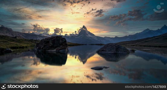 Matterhorn or Cervino reflection on lake stellisee in Zermatt in the mountains in the swiss Alps, Switzerland.