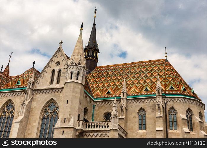 Matthias church in Hungarian Budapest with colorful roof slates. Matthias church in Hungarian Budapest with colorful roof