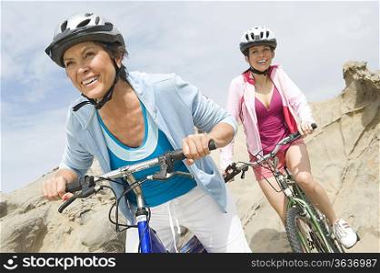Mature and mid adult women compete on a cycle ride