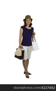 Mature Asian women holding shopping bags, sun glasses and purse on white background