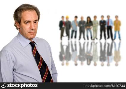 mature business man in front of a group of people