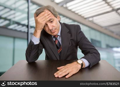 mature business man on a desk at the office