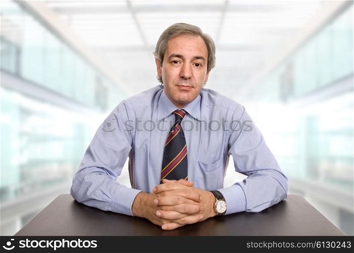 mature business man on a desk at the office