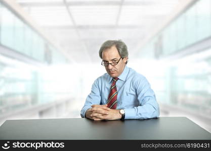 mature business man on a desk at the office