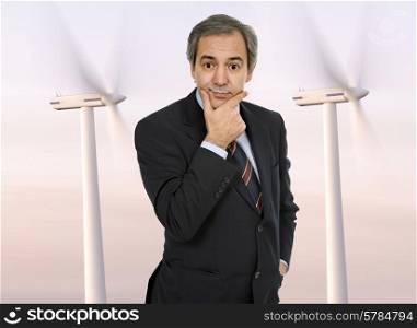 mature business man portrait thinking about alternative energy
