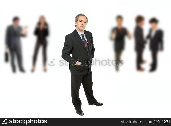 mature business man portrait with some people in the back