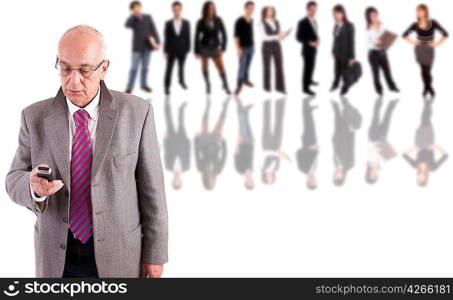 Mature business man posing, with people in background