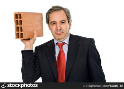 mature business man with a brick, on white