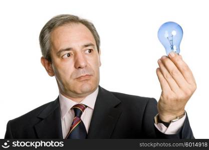 mature business man with a lamp isolated on white