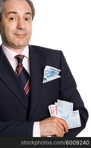 mature business man with money over white background