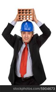 mature business man with two bricks, on white