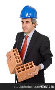 mature business man with two bricks, on white