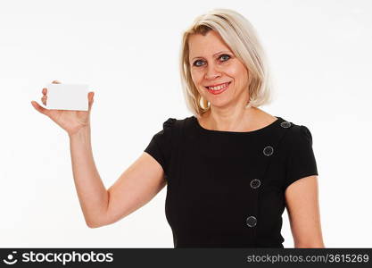 mature business woman holding a blank business card on white background