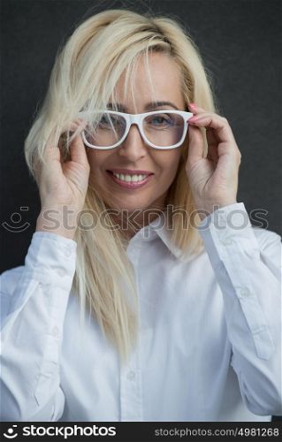 Mature business woman wearing glasses