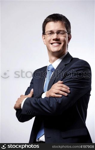 Mature businessman in glasses on a white background