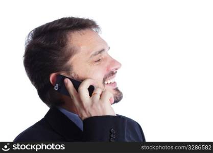 Mature businessman laughing on cellphone