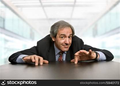 mature businessman on a desk at the office