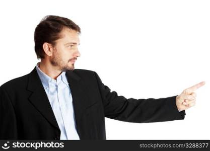 Mature businessman pointing at copyspace, isolated over white background