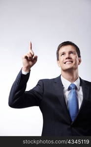 Mature businessman shows up finger