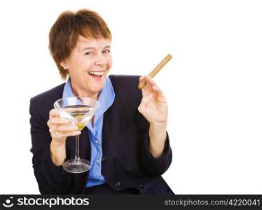 Mature businesswoman partying with a martini and a cigar.